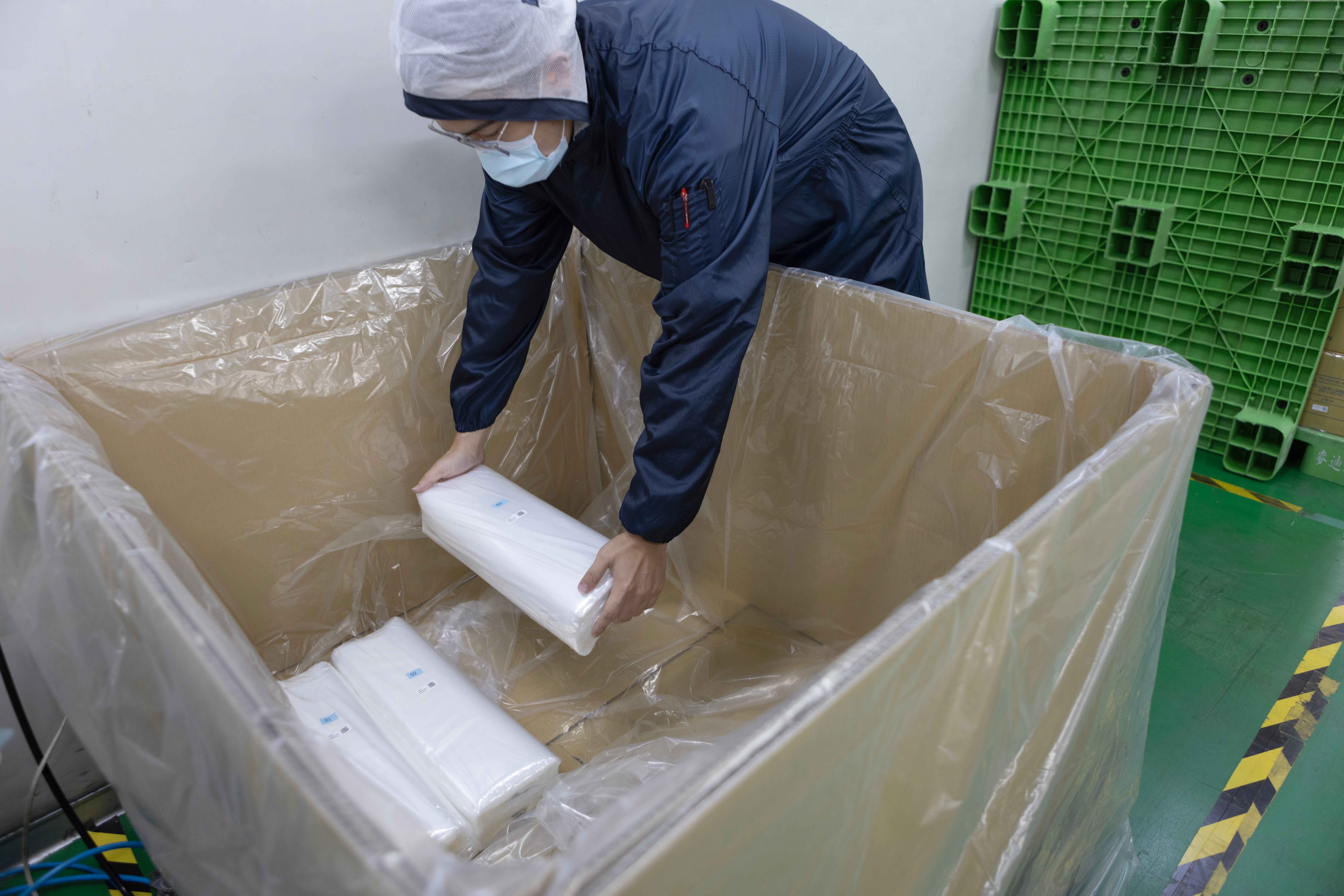 Bulky Pack - Stacked large cartons on pallets